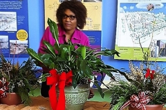 Pat Hart of the Resources Committee with some of the plants available at the sale